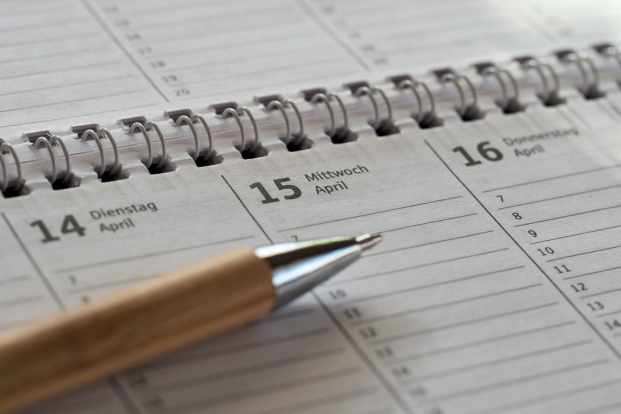 a wall calendar with appointments marked